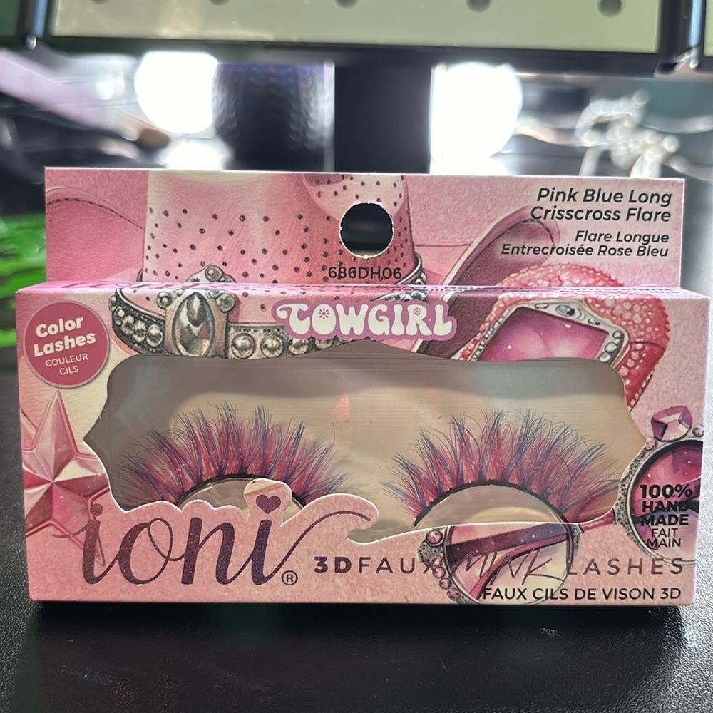Pink and blue cowgirl faux ioni eyelashes.